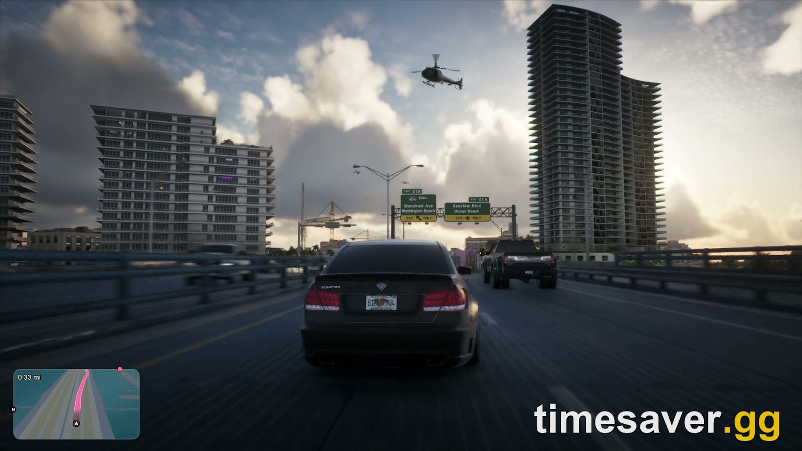 GTA 6 gameplay of a car driving on a Vice City highway toward Washington Beach with a helicopter overhead and the minimap showing the route