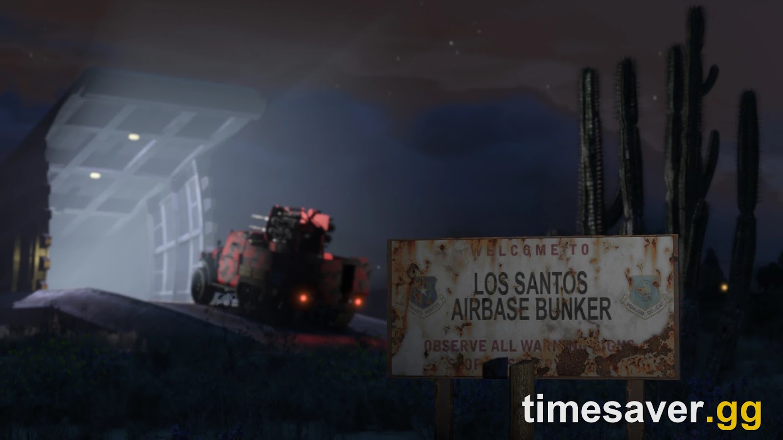 GTA Online bunker blast doors opening at night beside a rusted Los Santos Airbase Bunker sign, with an armed weaponised vehicle driving out