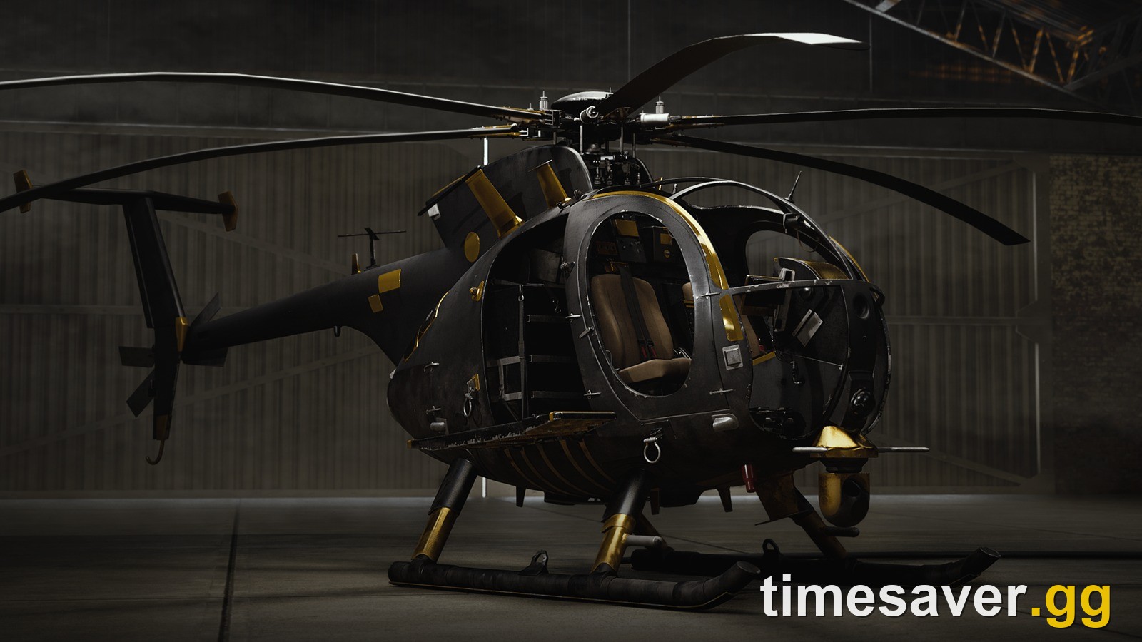 WARDOGS Little Bird helicopter in the Season 2 Black and Gold camo, parked in a hangar