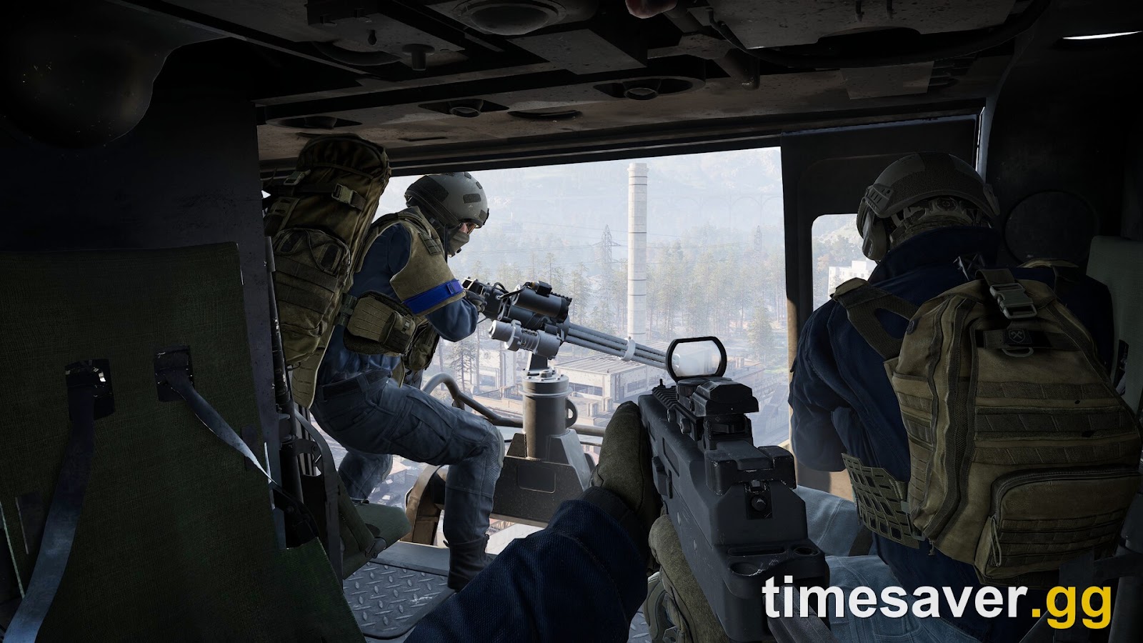 WARDOGS squad inside a transport helicopter, one soldier manning a mounted minigun over an industrial zone