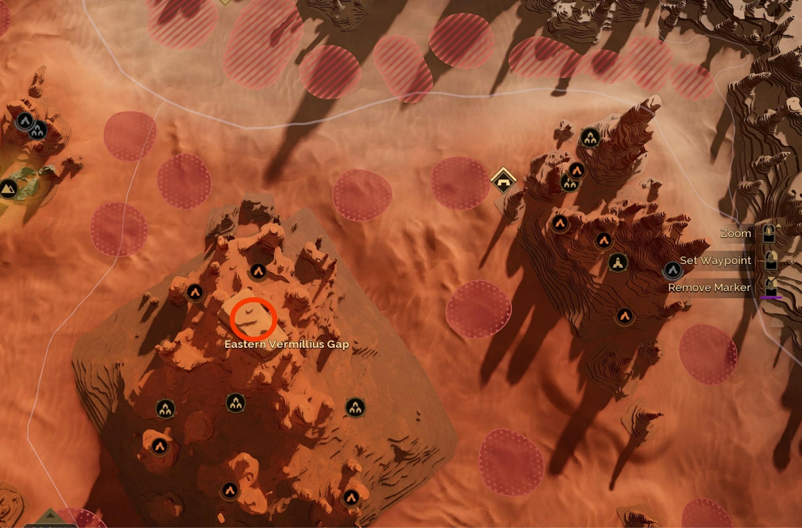 Mirzaba's Head hammer-shaped rock formation with chest at summit