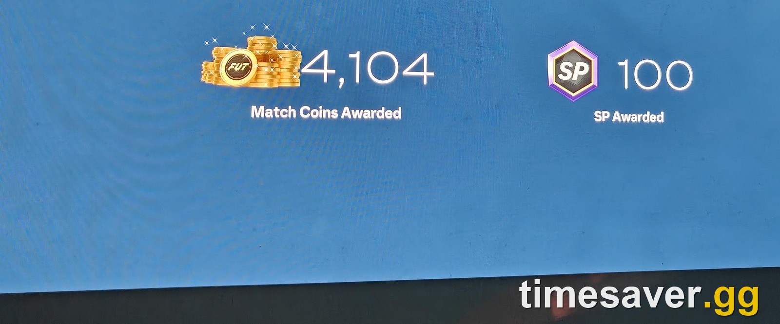 FC 27 post-match reward panel showing 4,104 Match Coins Awarded and 100 SP Awarded