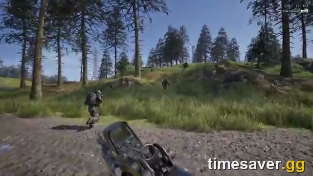 A WARDOGS squad advances on foot through a forest clearing under fire